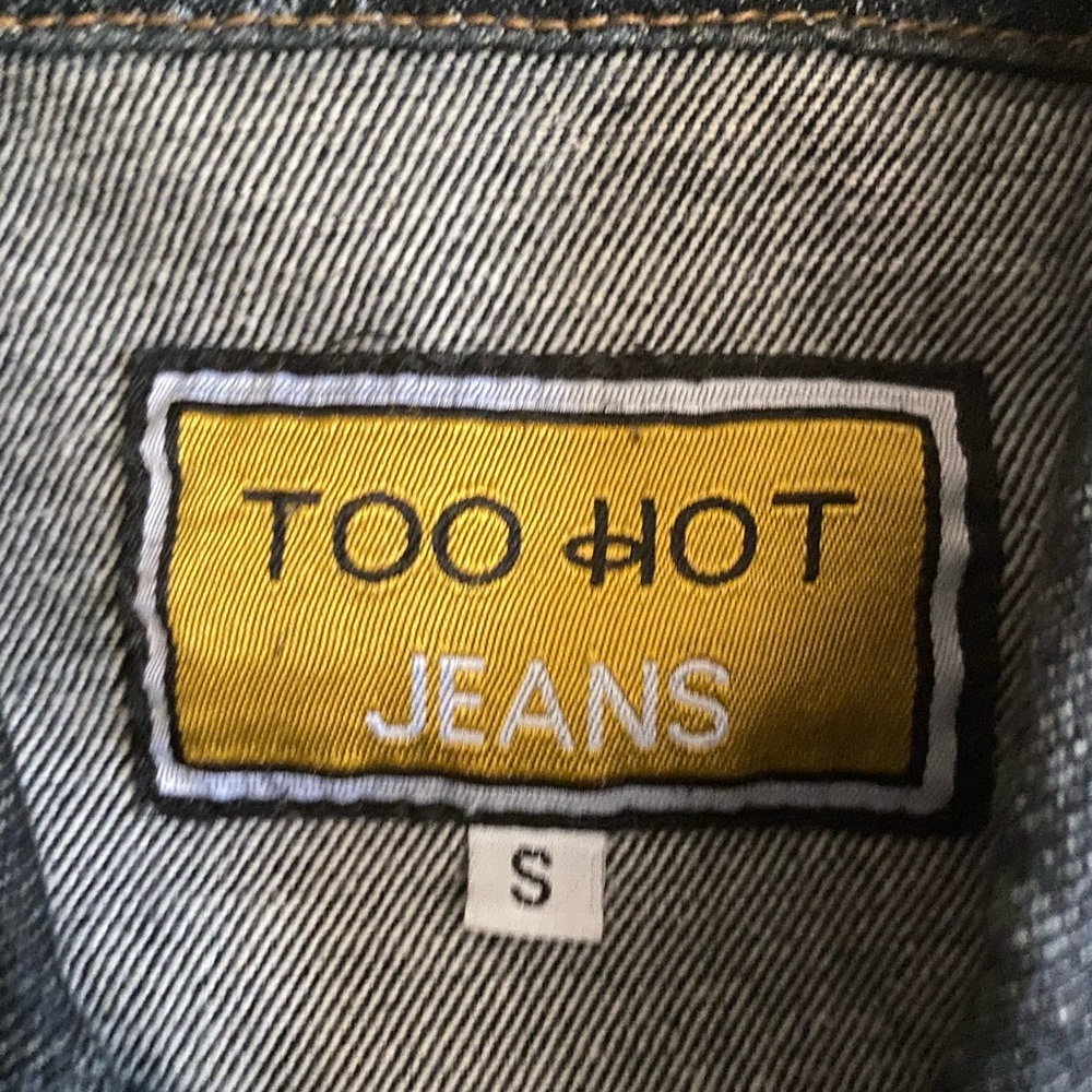 Too Hot Jeans jacket this is a size small. Blue with whiteish patches
